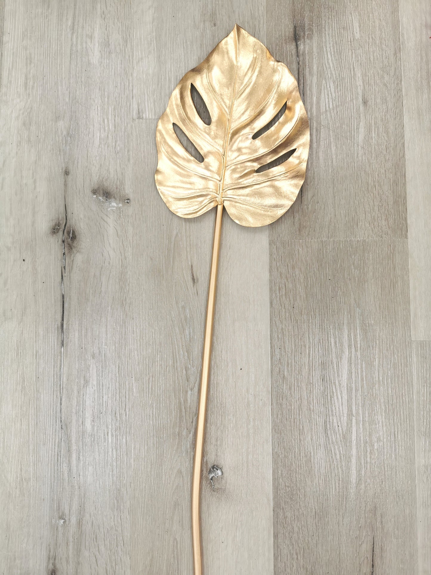 Artificial Monstera leaf, available colors: gold and silver, available size: small and large