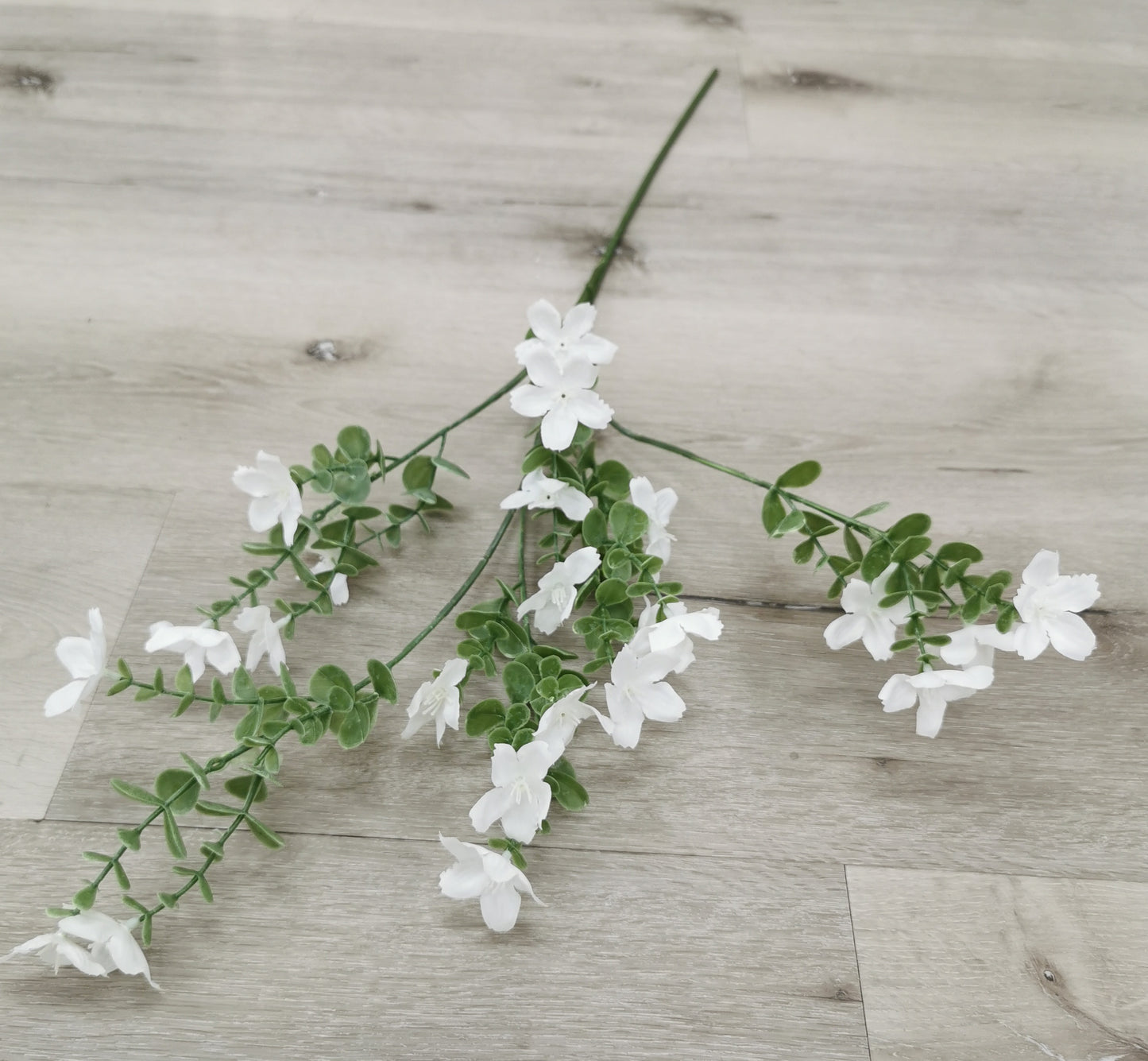 White Flower with Green Leaves