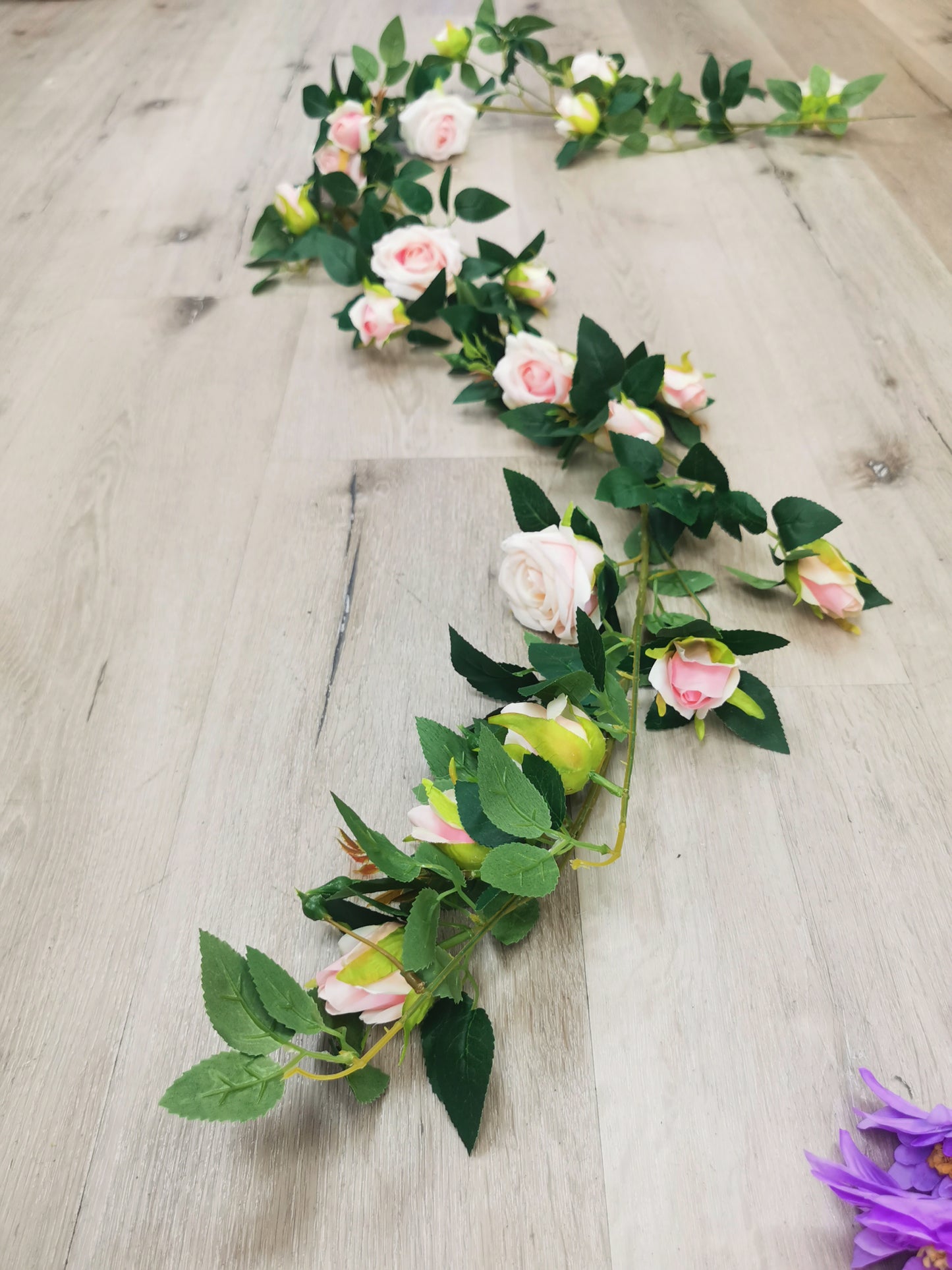 Hanging Pink Rose with Green leaves